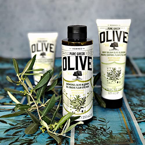 KORRES olive oil shower gel foam close-up demonstrates soothing hydration.
