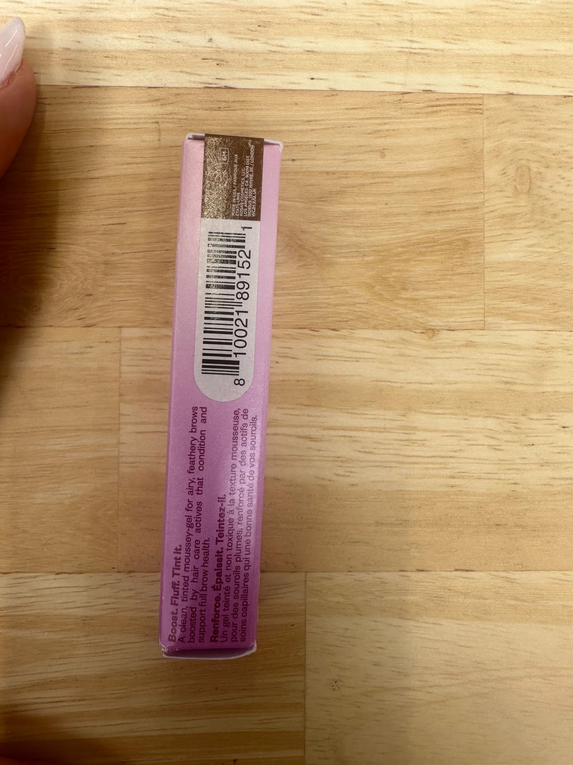 Kosas Air Brow Tinted Gel triangular spoolie lifting brow hairs