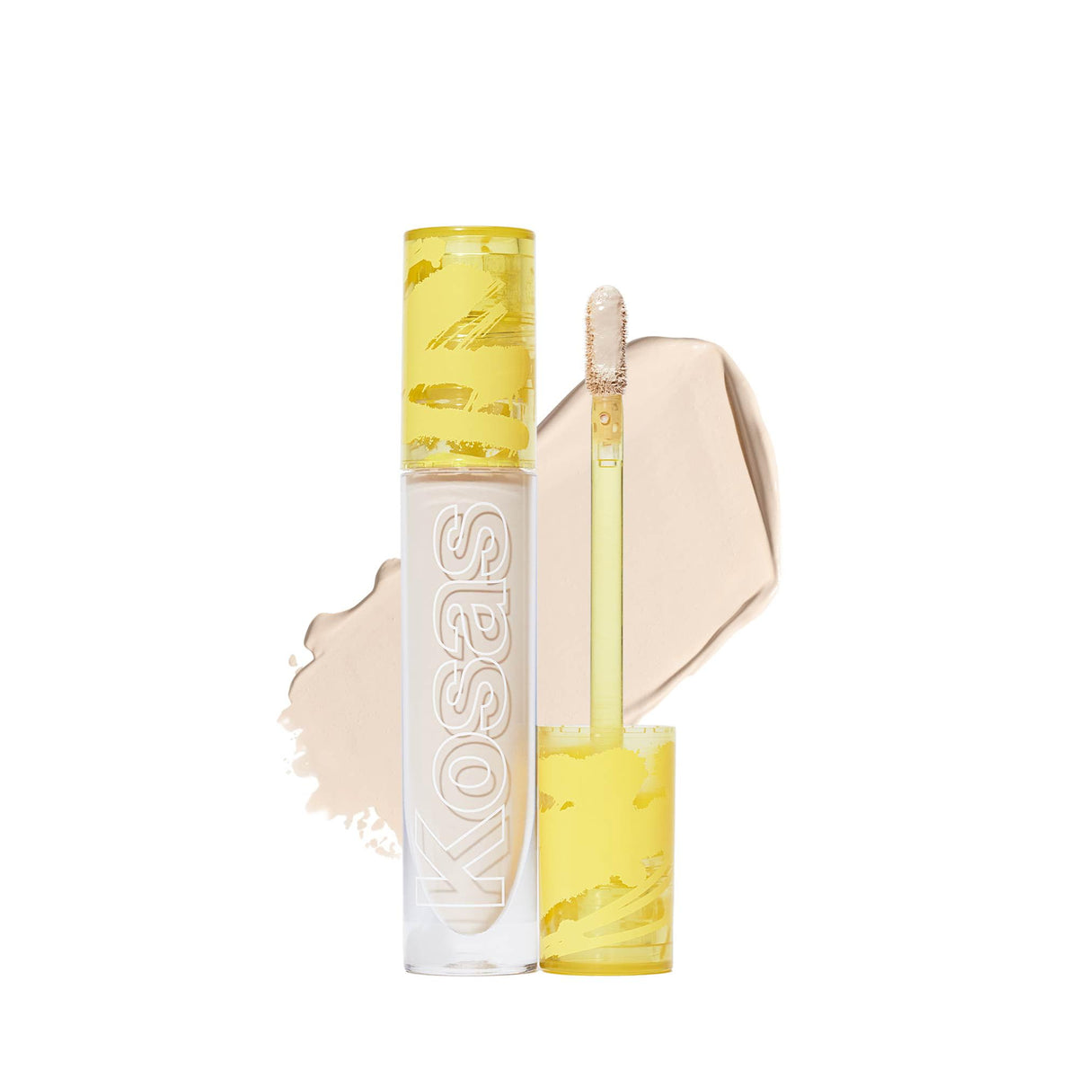 Kosas Revealer Concealer tube applying medium coverage to brighten under-eye area