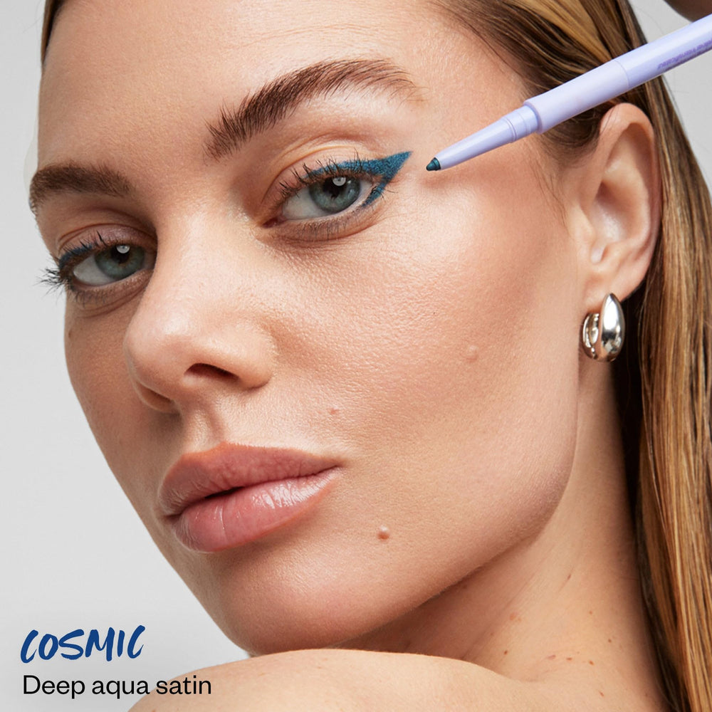 Kosas Soulgazer Cosmic swatch reveals rich deep aqua satin pigment for vivid definition.