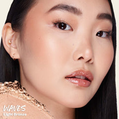 Kosas Sun Show Waves swatch showing sun-kissed color in buildable formula.