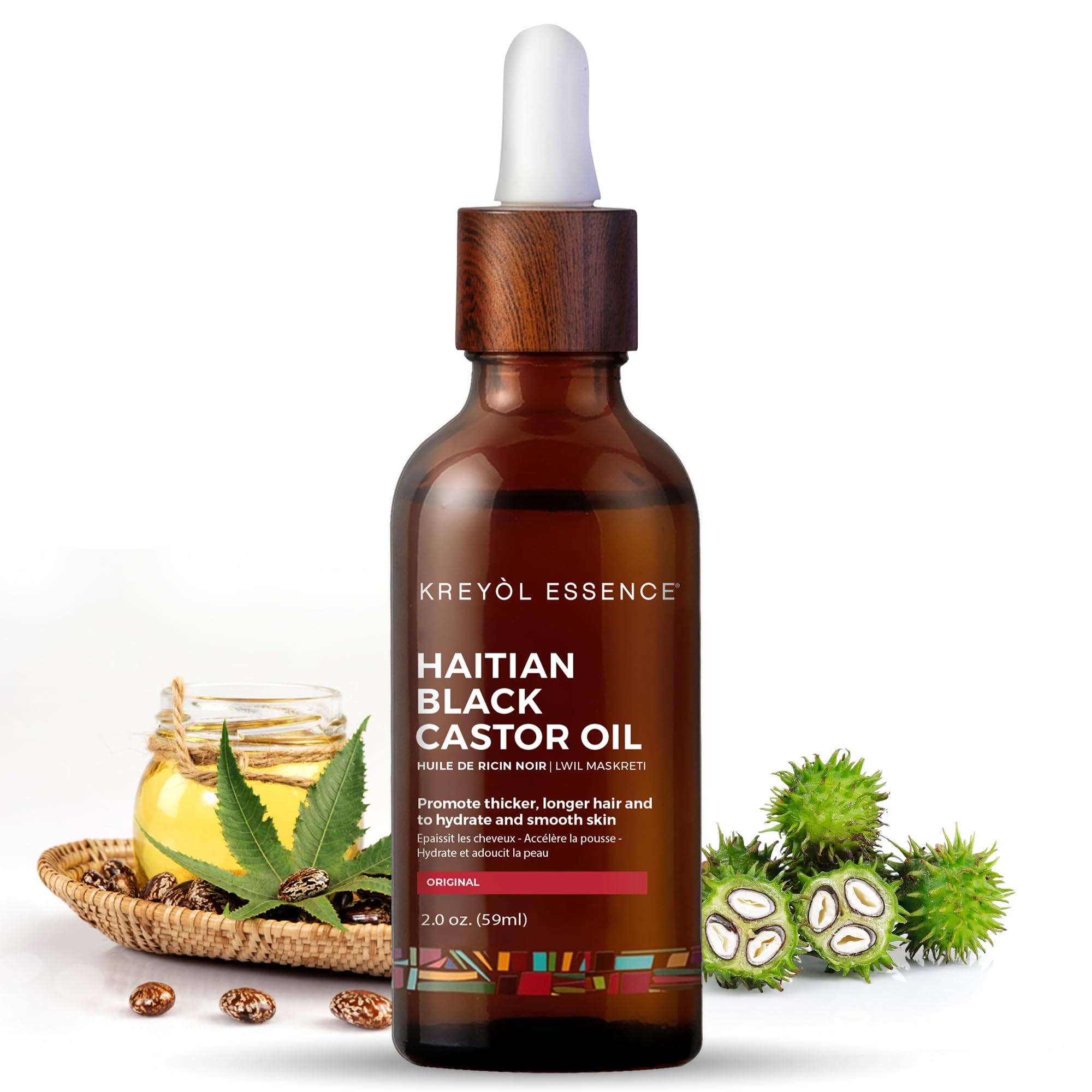 KREYÒL ESSENCE 2 Oz Haitian Black Castor Oil bottle front view, highlighting fuller brows and lash health.