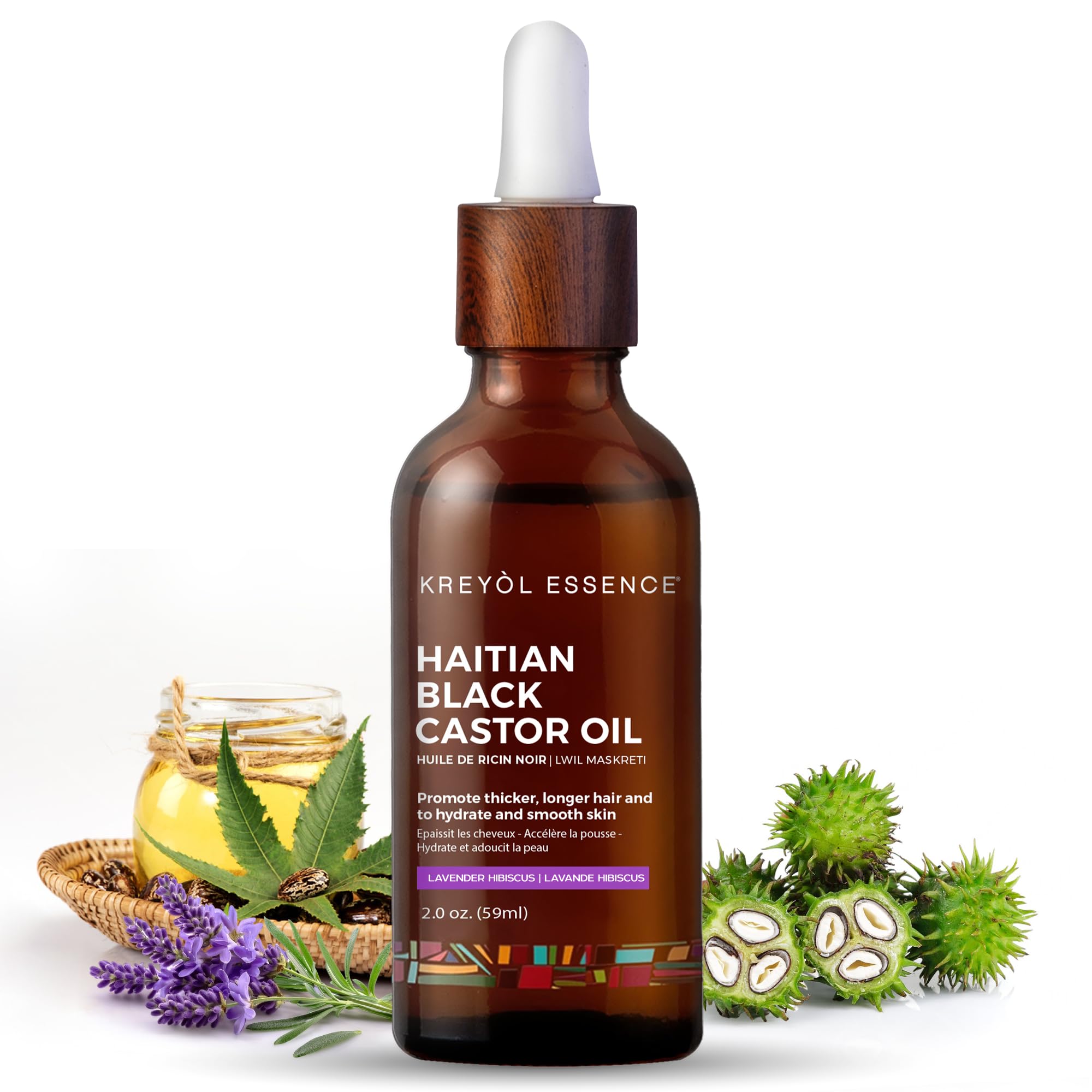 Kreyol Essence Haitian Black Castor Oil in glass bottle for hair and skin nourishment.
