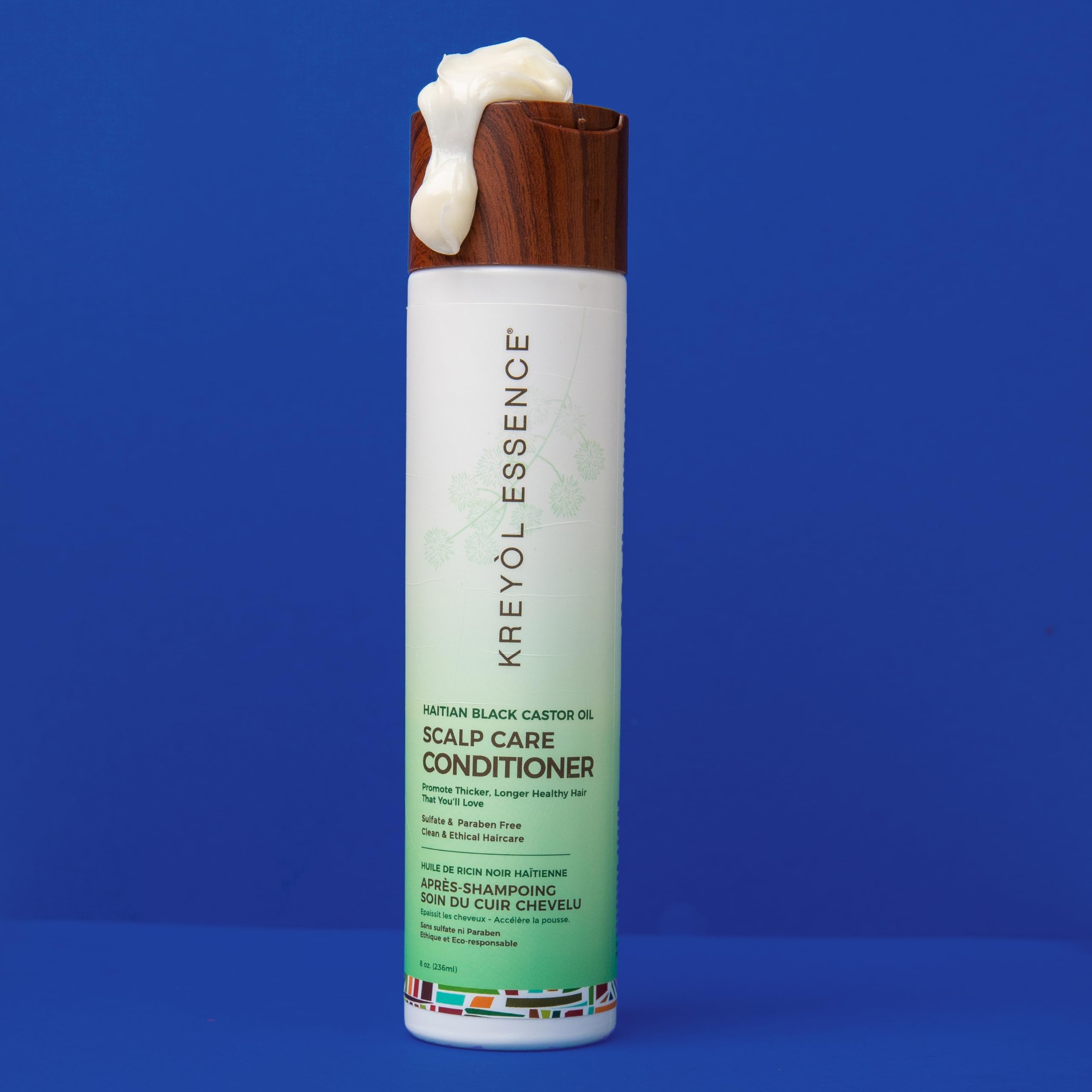 Kreyol Essence eco-friendly packaging emphasizing earth-friendly and empowering mission