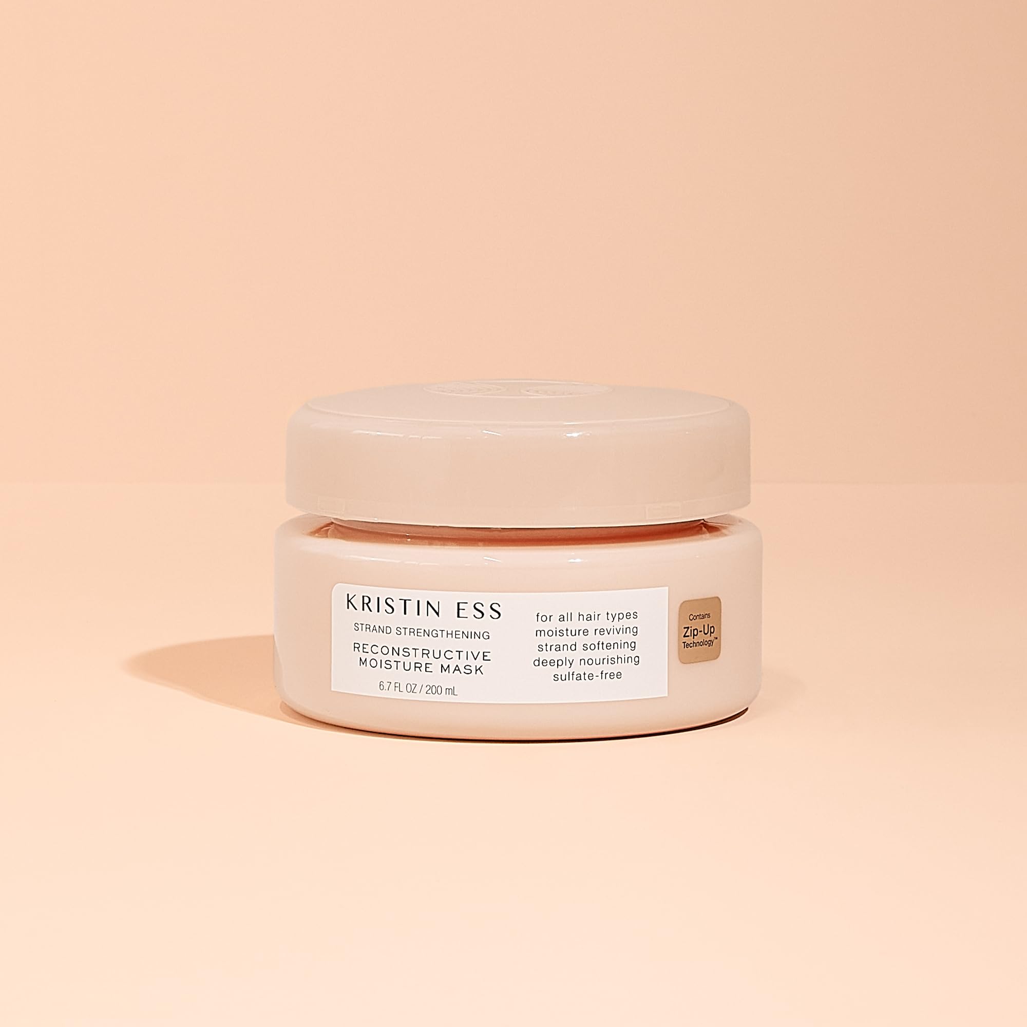 Kristin Ess cruelty-free icon reinforces ethical hair care choice.