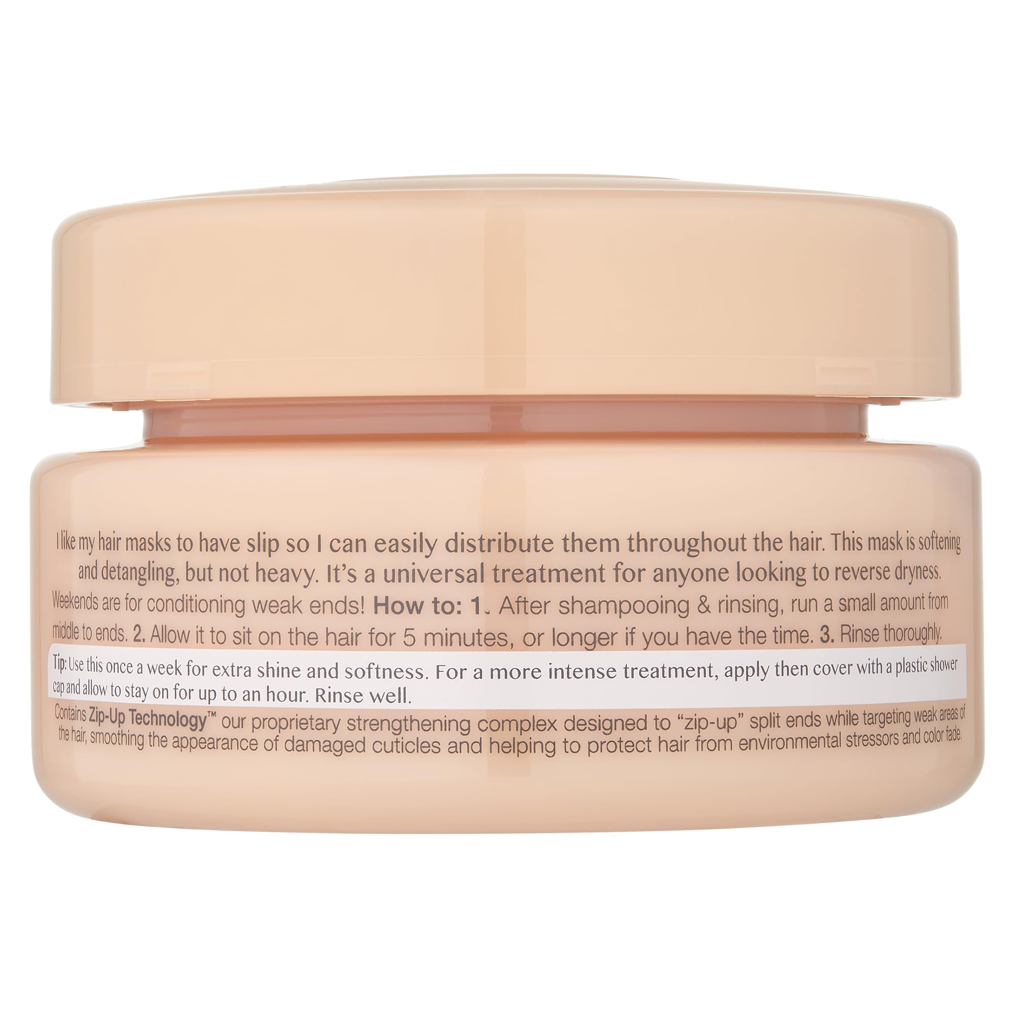 Kristin Ess Hair Mask jar closeup shows creamy texture for detangling.