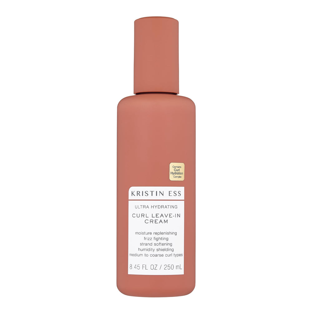 Kristin Ess Ultra Hydrating Curl Leave-In Cream bottle close-up showing hydrated curls.