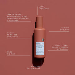 Kristin Ess Ultra Hydrating Curl Leave-In Cream dispenser demonstrates frizz control for curly hair.