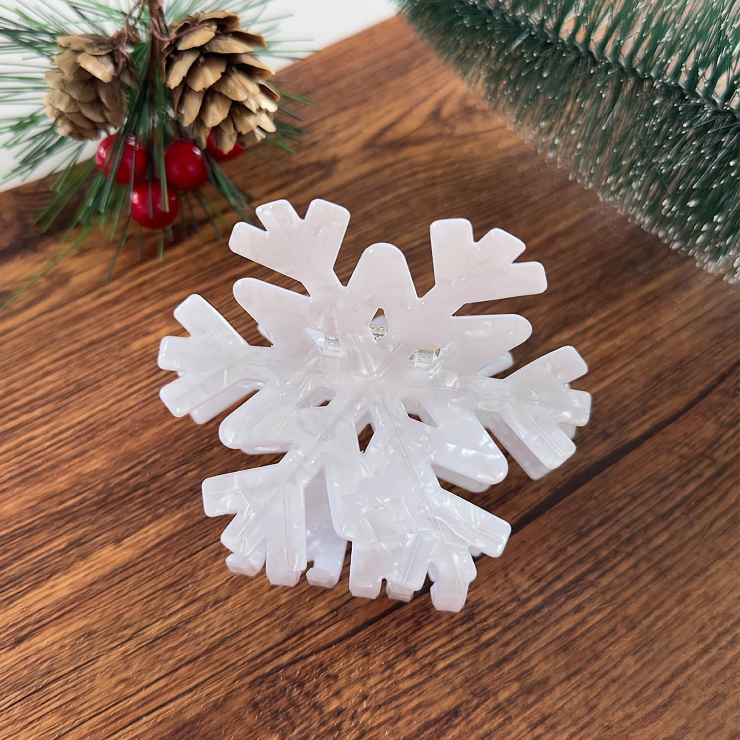 KSTBJN flat layout of snowflake clip illustrating compact holiday accessory