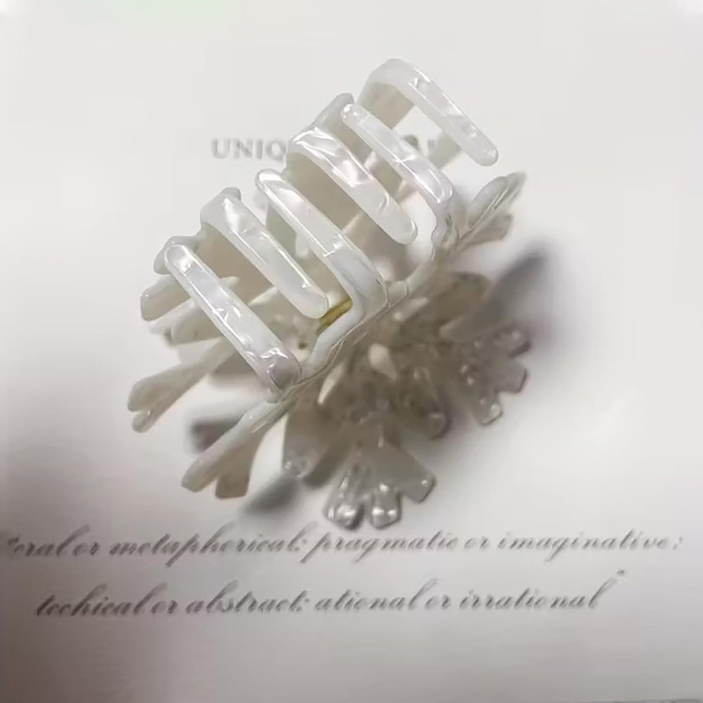 KSTBJN model wearing snowflake clip for an elegant holiday look