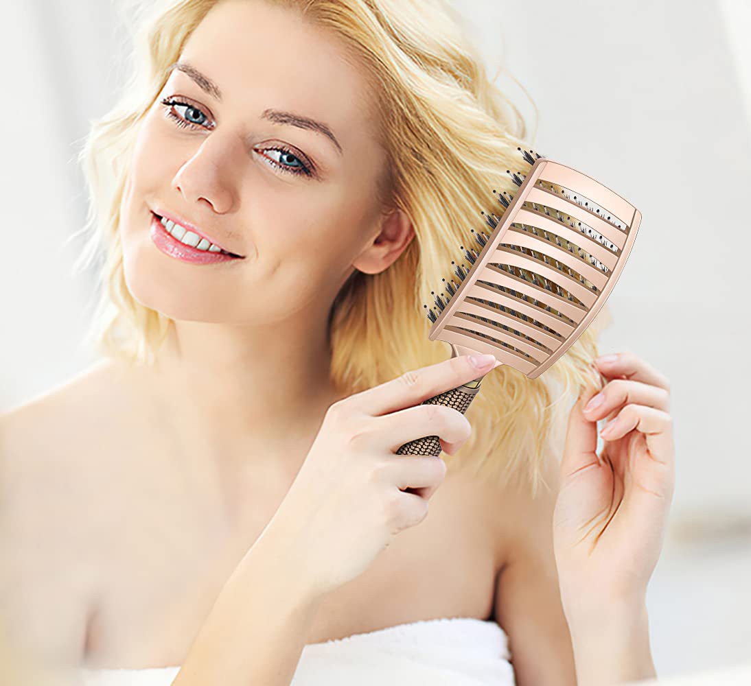 KTKUDY detangling brush for thick curly hair easing knots with less pulling.