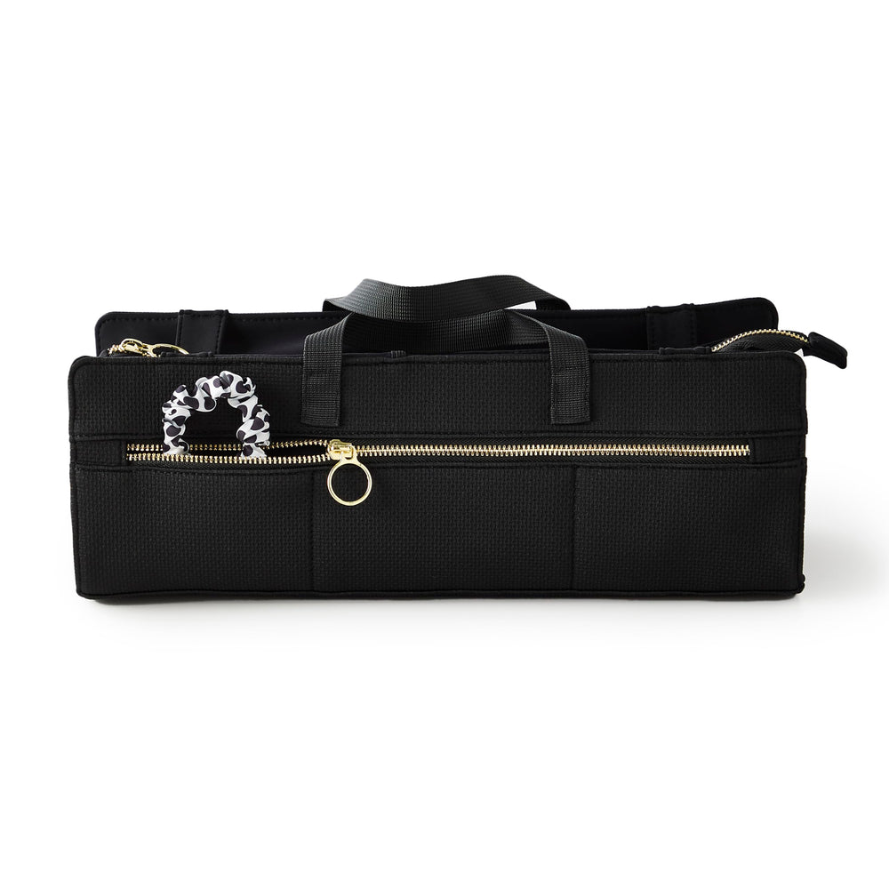 KUSSHI bag center compartment fits flat irons and wands neatly.