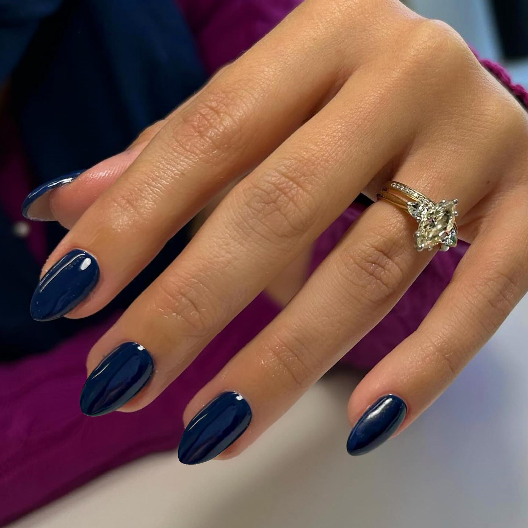 KXAMELIE navy blue press-on short oval nails, front view with glossy finish