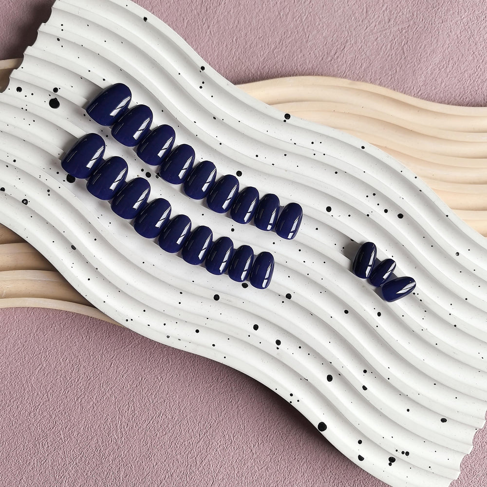KXAMELIE navy blue press-on nails packaging and 24-piece set