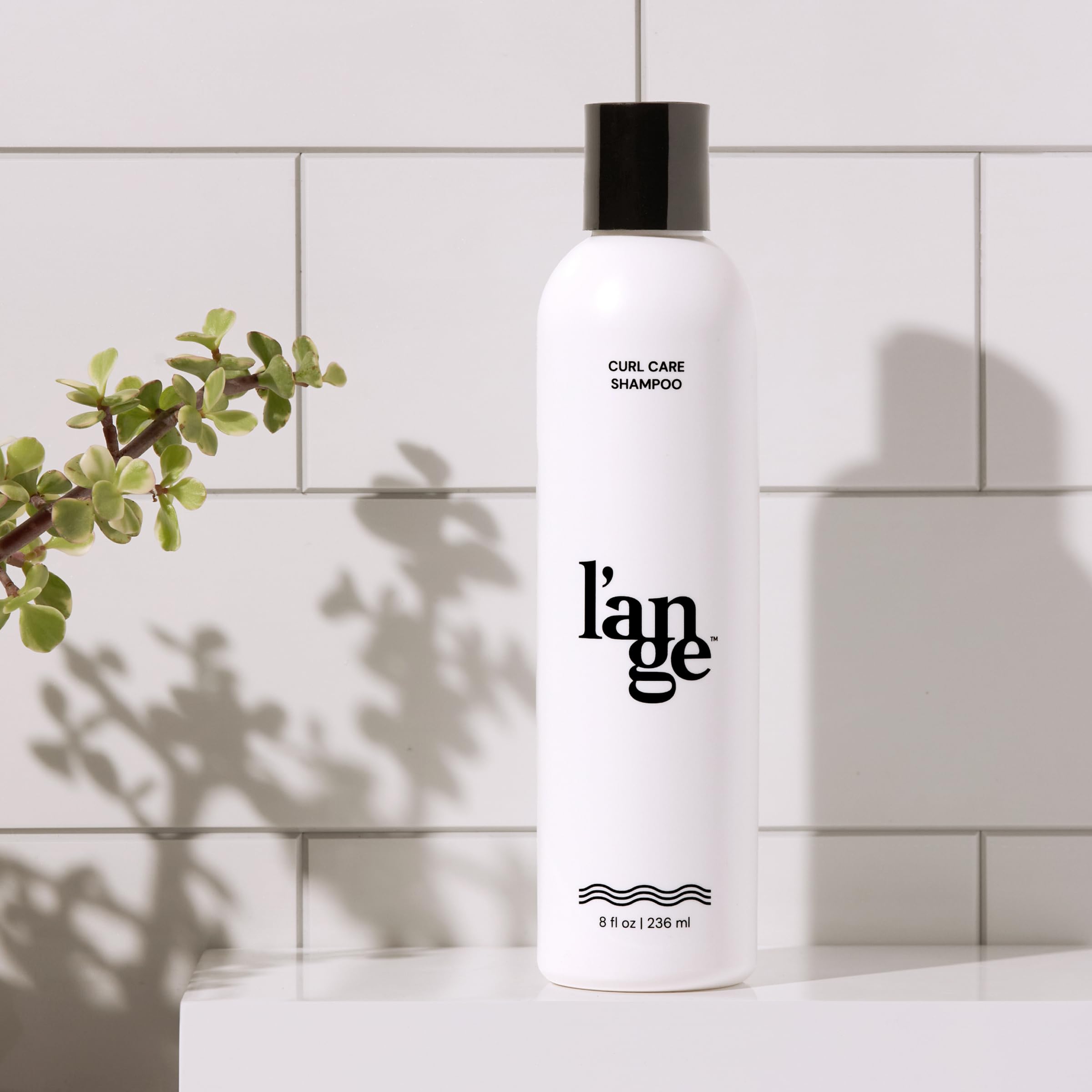L'ANGE HAIR Curl Care Gentle Shampoo during rinse cleanses without residue, leaving cleanse-ready curls.