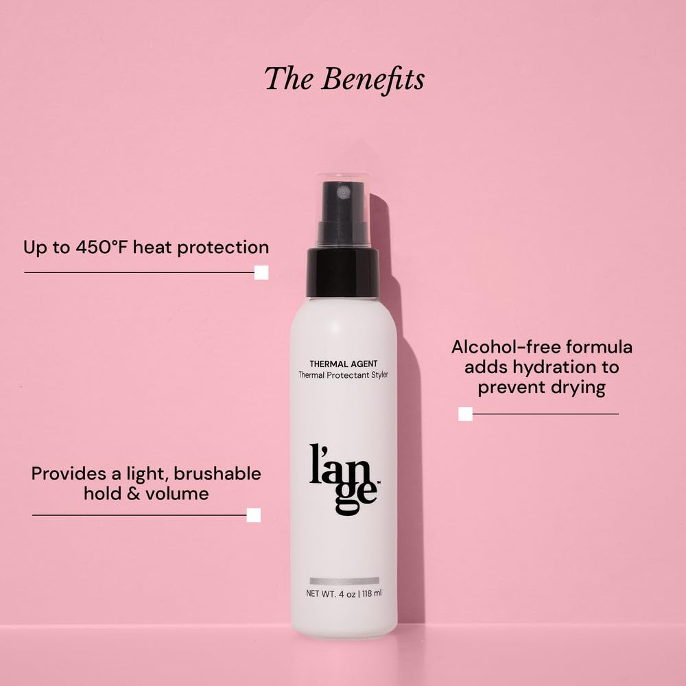 L'ANGE HAIR Thermal Agent spray being applied to damp hair for smoother styling