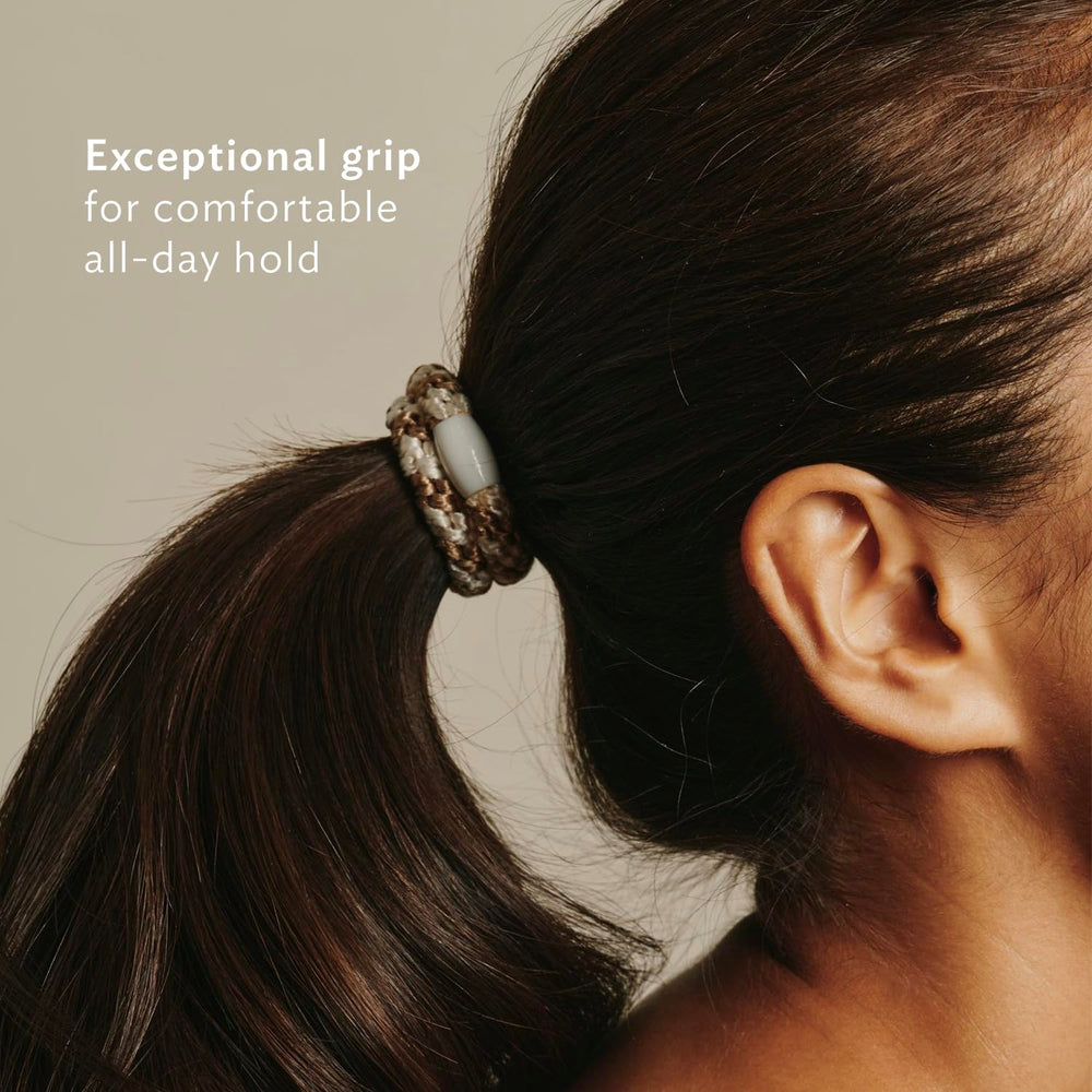 L. Erickson beads in neutral tones complement each tie