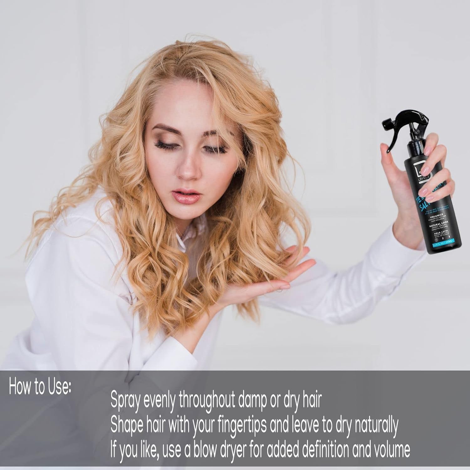 L3 misting dry hair to refresh texture and separate strands without stiffness