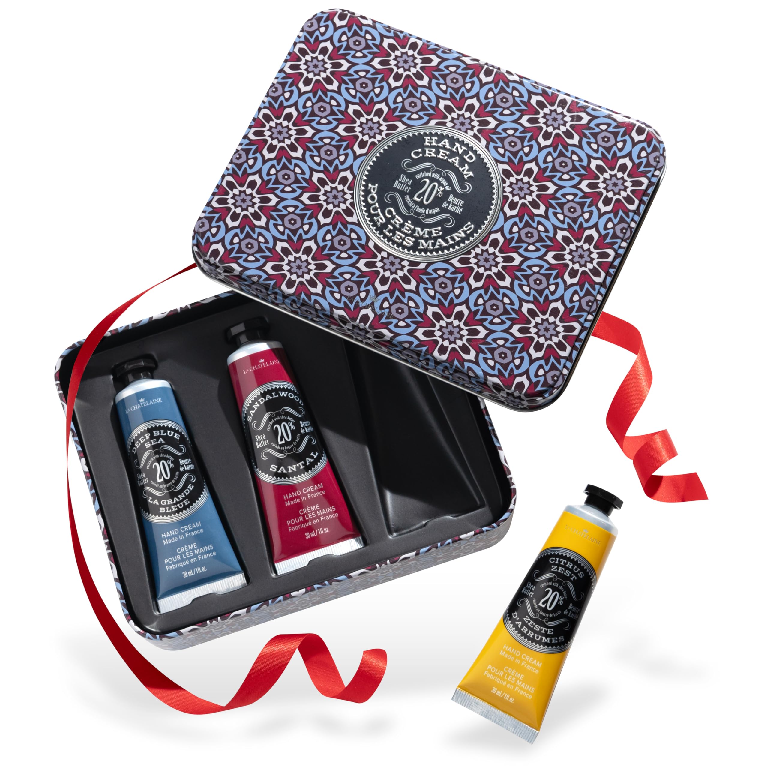 La Chatelaine hand cream gift set packaging close-up, gift-ready trio tin for on-the-go moisture.