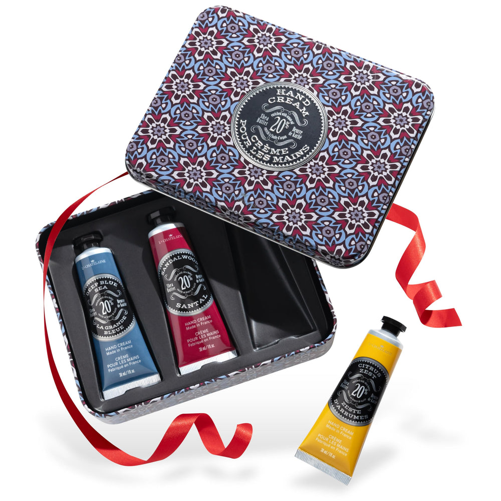 La Chatelaine hand cream gift set packaging close-up, gift-ready trio tin for on-the-go moisture.