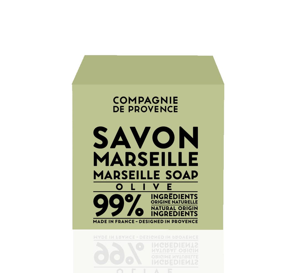 La Compagnie de Provence Savon Marseille Olive Soap Cube 400g face use demonstrates gentle cleansing.