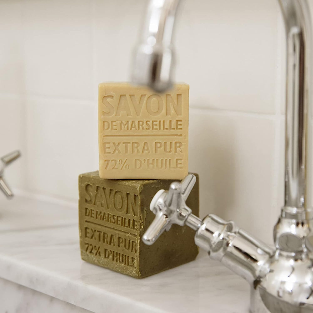 La Compagnie de Provence Savon Marseille Palm Soap Cube closeup emphasizes natural palm oil for gentle cleansing.