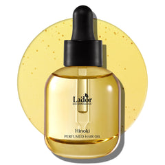 LA'DOR Hinoki hair perfume oil bottle for frizz control and glossy finish.