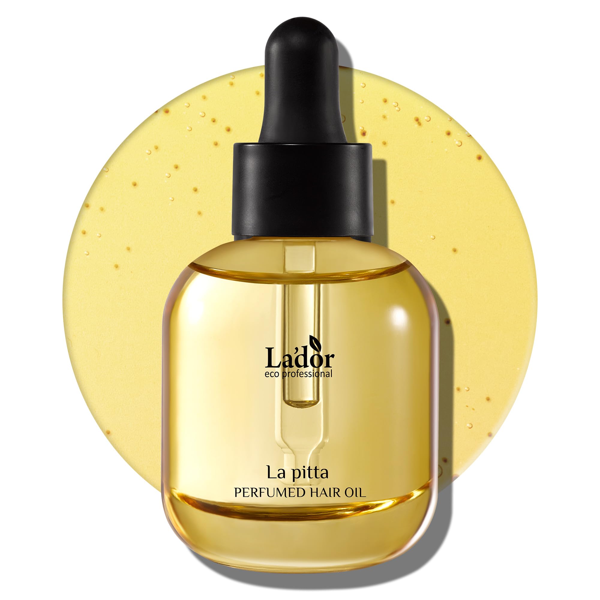 LA'DOR hair perfume oil bottle closeup shows glossy finish and nourishing shine