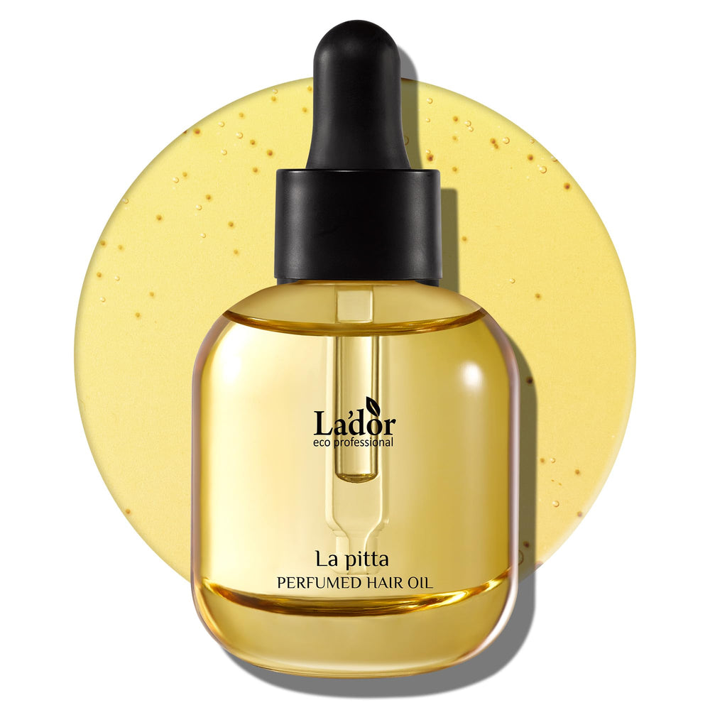 LA'DOR hair perfume oil bottle closeup shows glossy finish and nourishing shine