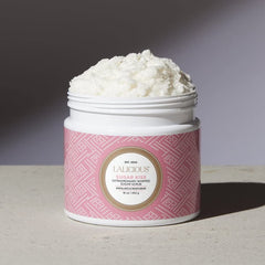 LaLicious Sugar Kiss Scrub jar close-up highlights whipped texture and luxury.