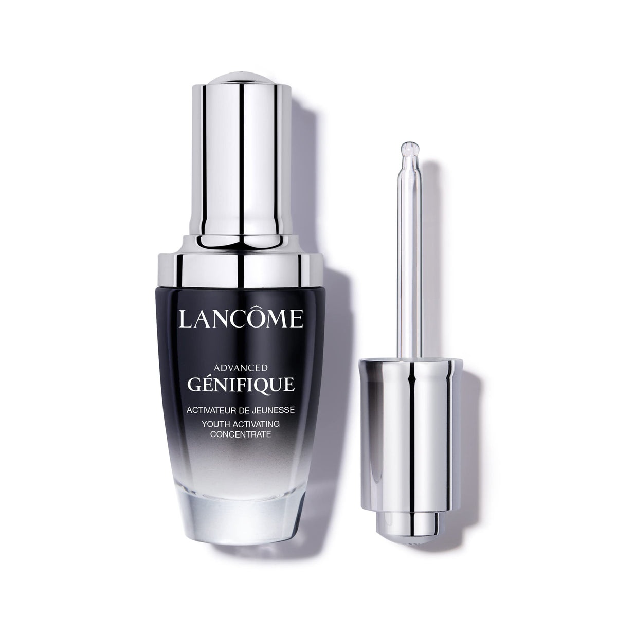 Lancôme Advanced Génifique serum pump close-up showing hydration-boosting formula for radiant skin
