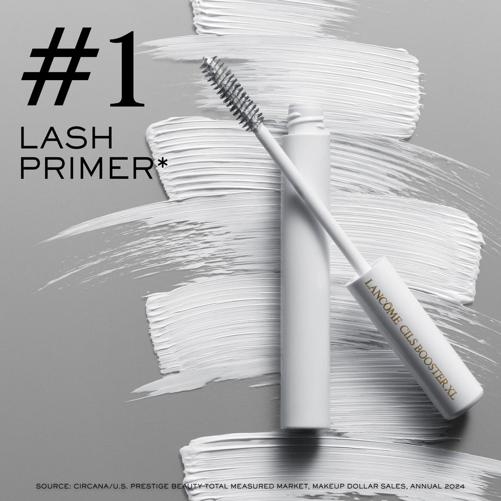 Lancome Cils Booster XL base coating on lashes for smoother mascara.