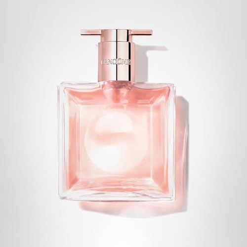 Lancôme Idôle perfume on skin showing lasting floral fragrance.