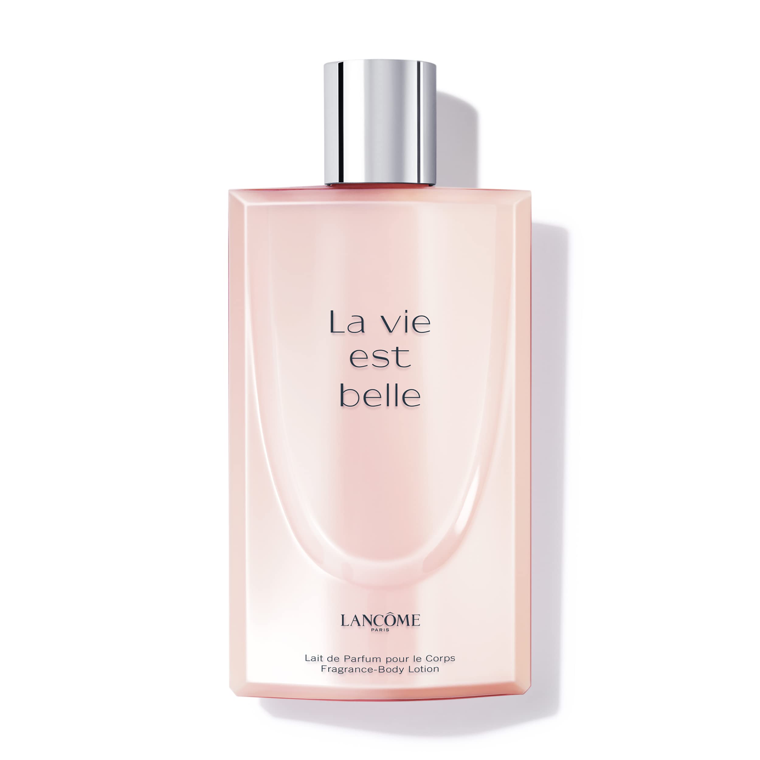 Lancôme La Vie Est Belle lotion bottle showcasing iris scent for radiant skin.