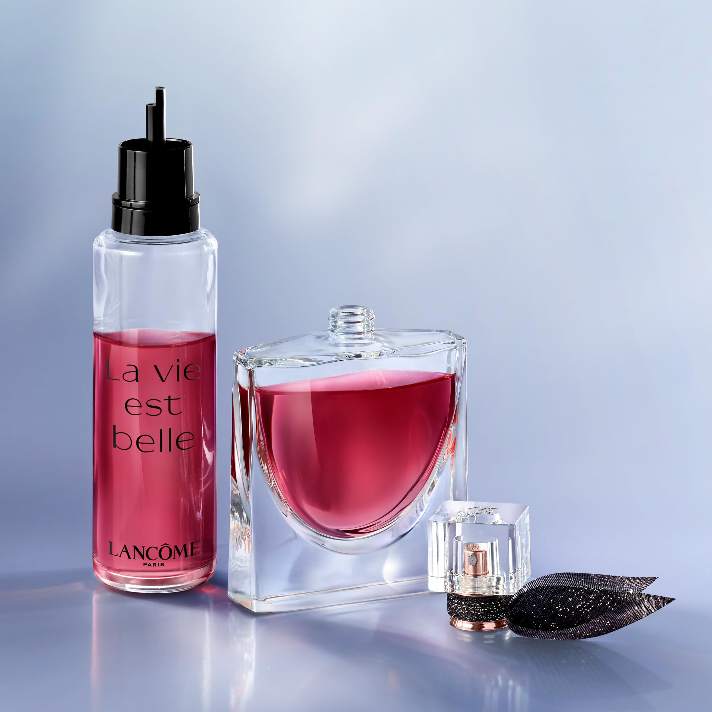 Lancôme La Vie Est Belle L'Elixir refill bottle shown, emphasizing lasting happiness.