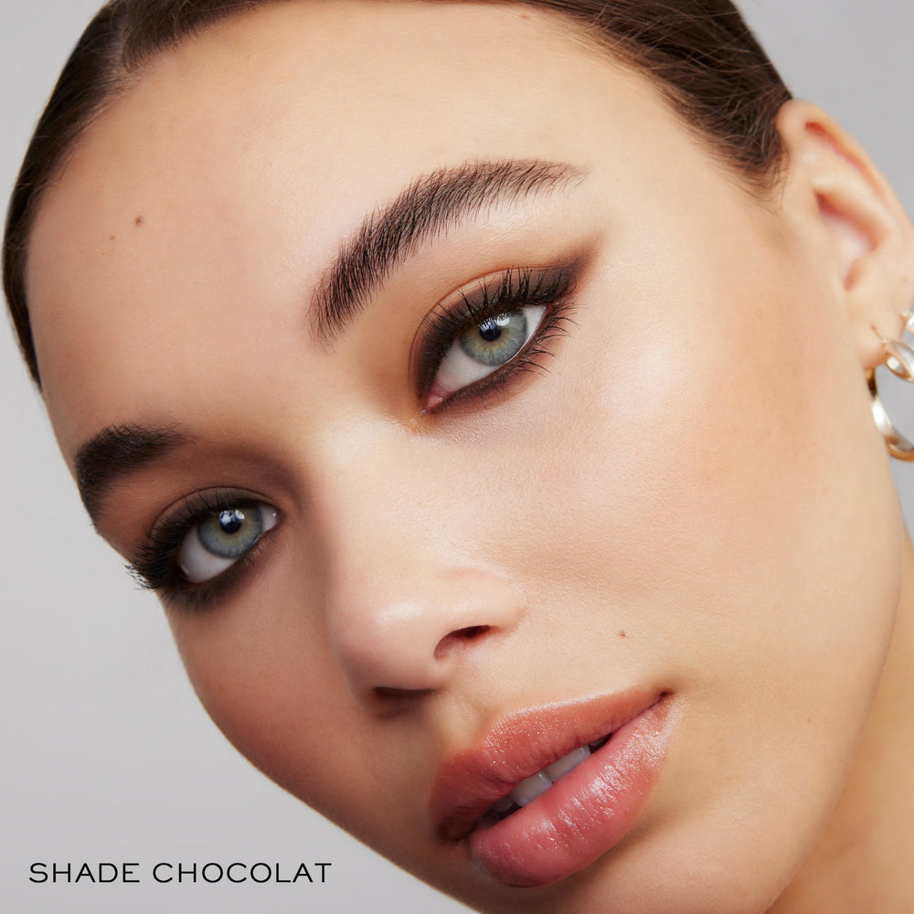 Lancôme French heritage frame highlights luxury beauty ritual.