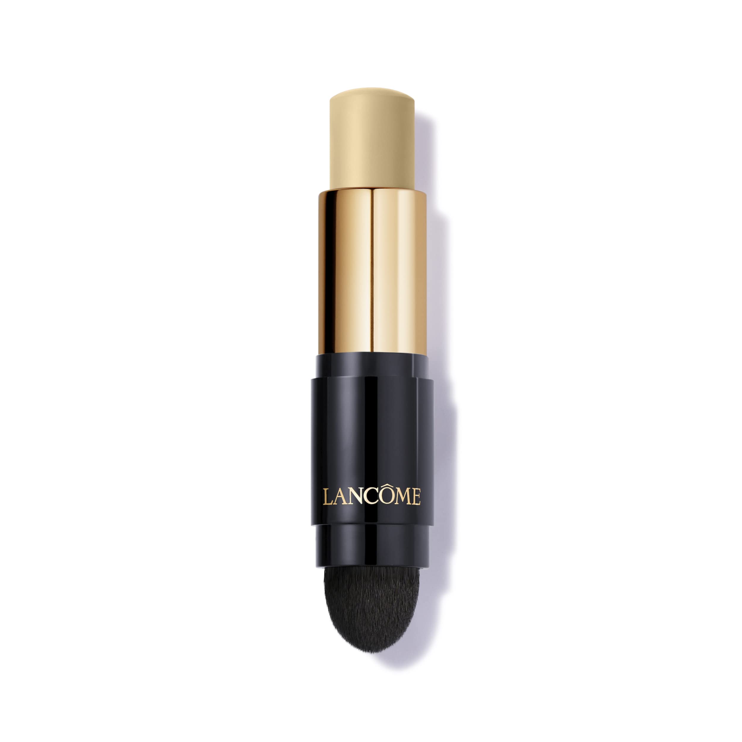 Lancôme Teint Idôle Ultra Wear foundation stick with built-in kabuki brush for quick, even application.