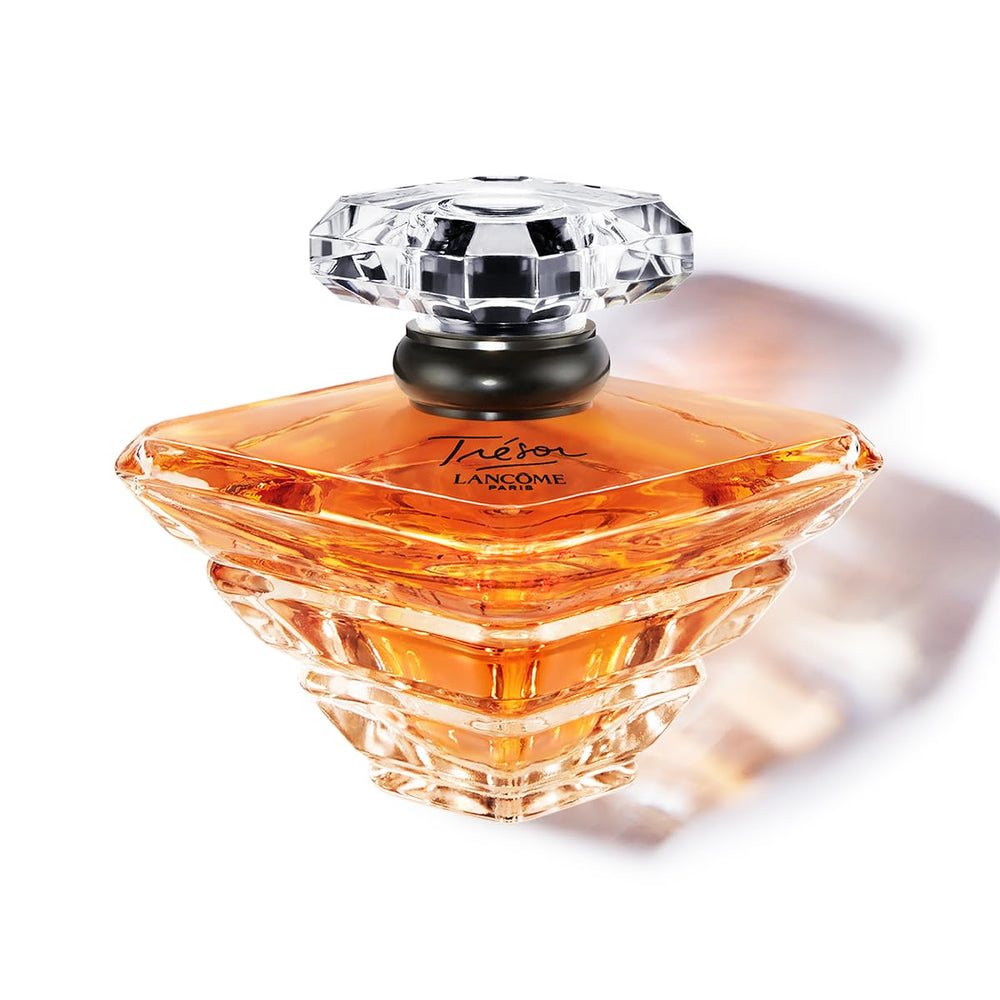 Lancôme Trésor EDP bottle displayed for timeless elegance on shelf.