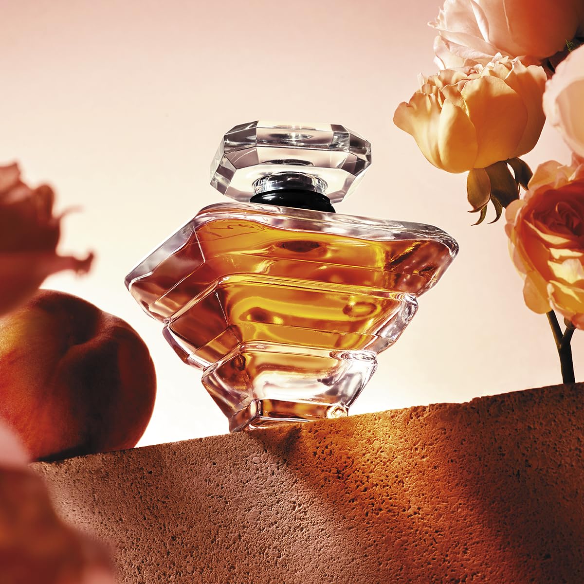 Lancôme Trésor golden juice suggests radiance and warmth.