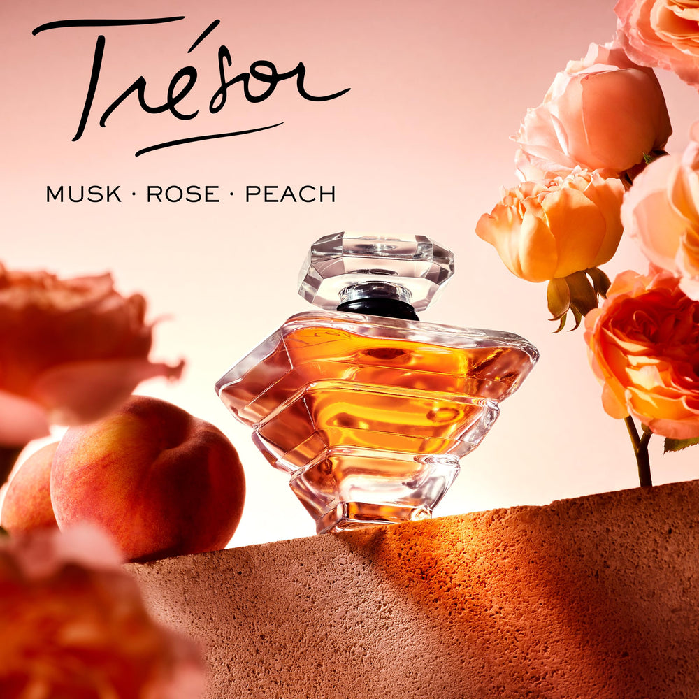 Lancôme Trésor reveals rose and lilac notes for a romantic scent profile.