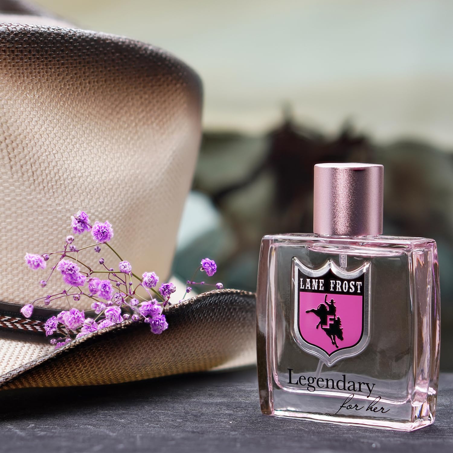 Lane Frost Legendary For Her fragrance diffusion image suggests long-lasting sillage and warm amber notes