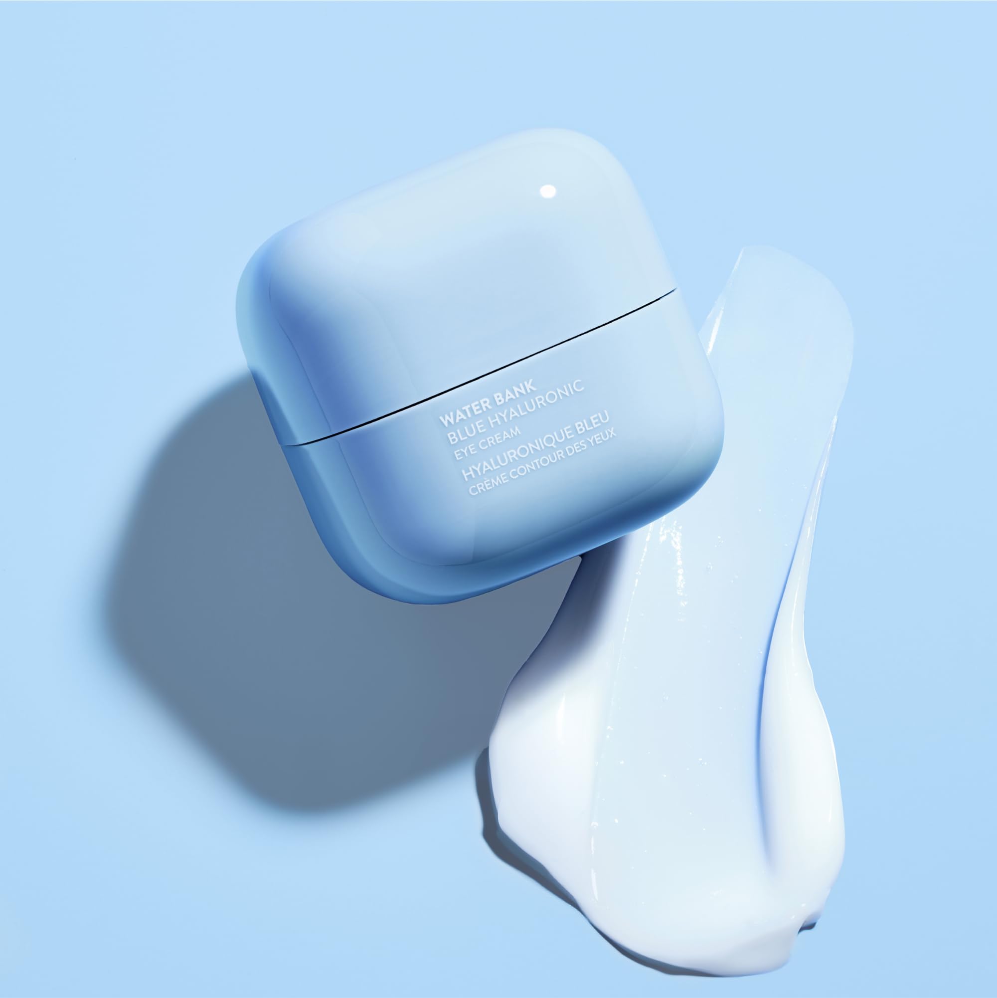 Laneige Water Bank Blue Hyaluronic Eye Cream dispenser demonstrates a smooth texture for morning application.
