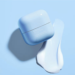 Laneige Water Bank Blue Hyaluronic Eye Cream dispenser demonstrates a smooth texture for morning application.