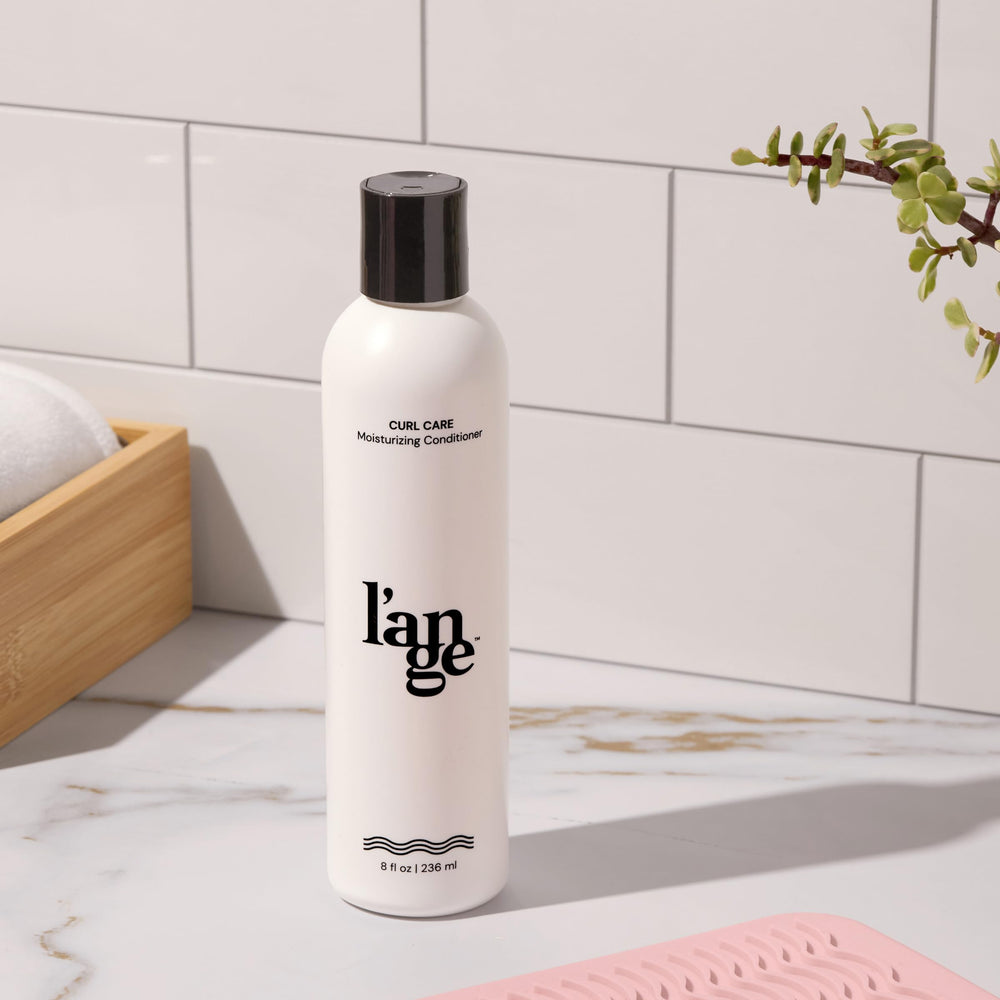 L'ANGE HAIR Curl Care model curls image showcases bounce and shine.