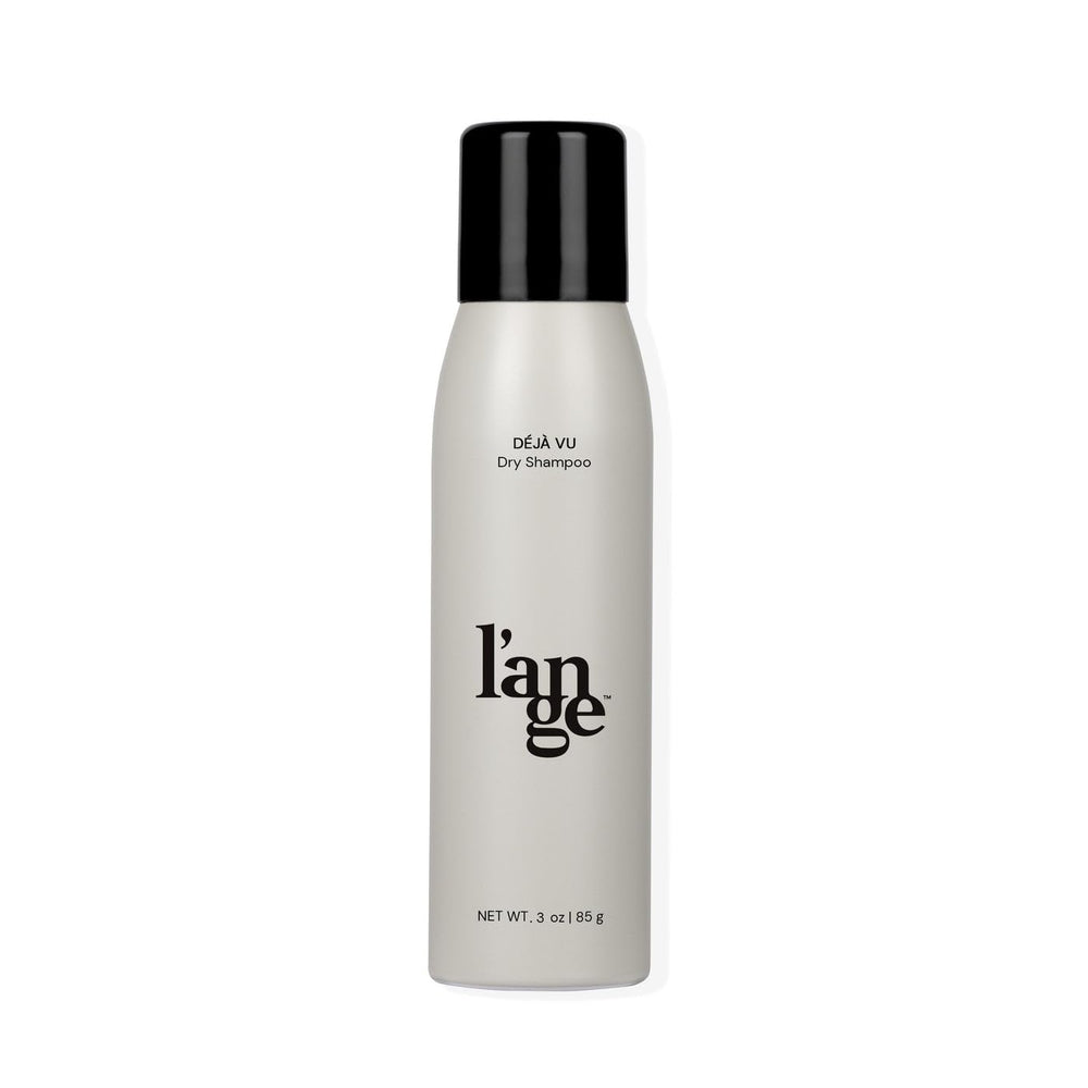 L'ANGE HAIR Deja Vu dry shampoo bottle close-up showing oil absorption for refreshed strands.