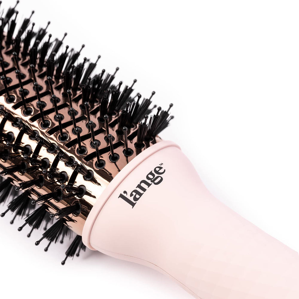 L'ANGE HAIR Le Volume 60mm oval barrel provides precise, shoulder-length styling with controlled lift.