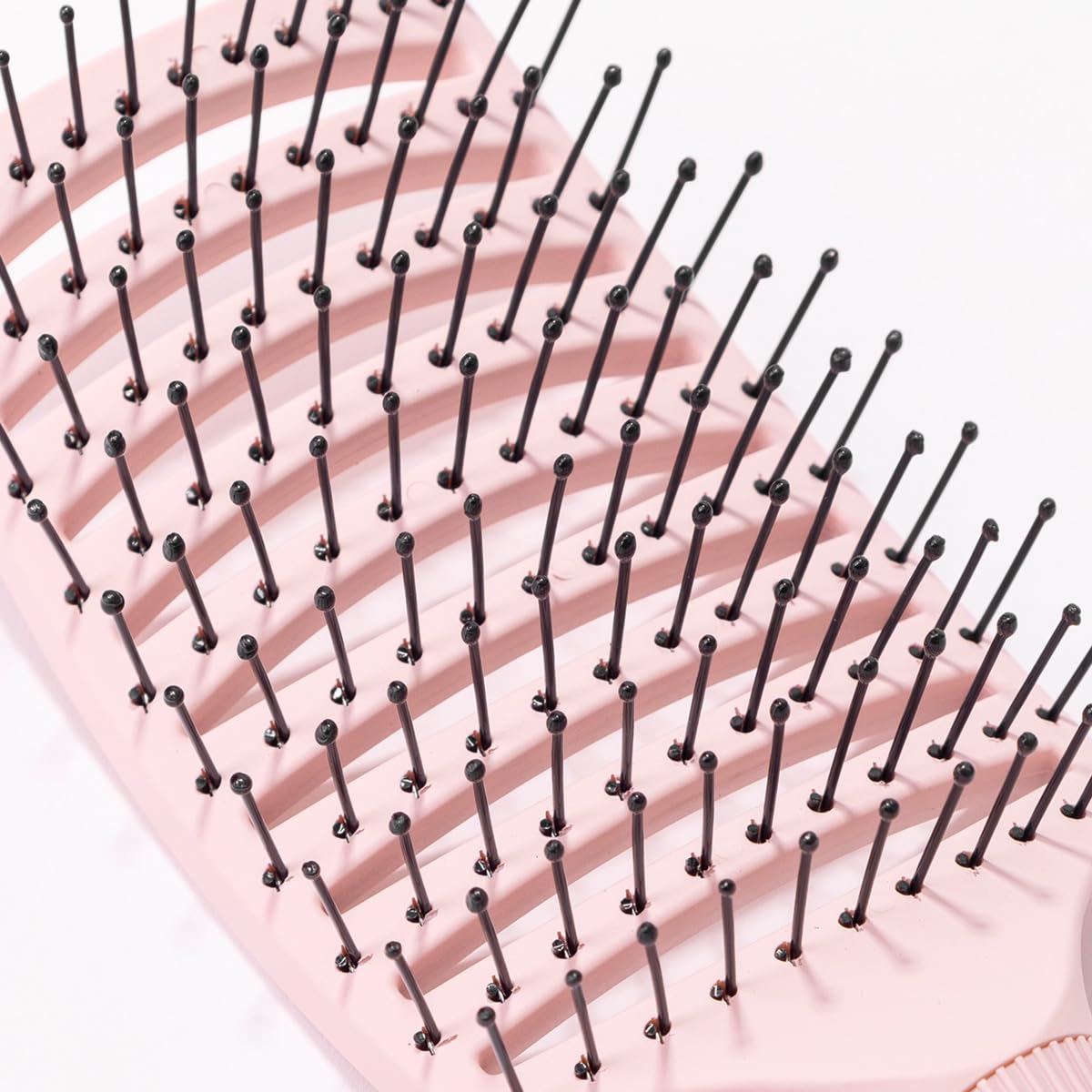 L'ANGE HAIR Siena brush demonstrates versatility for all hair types and textures.