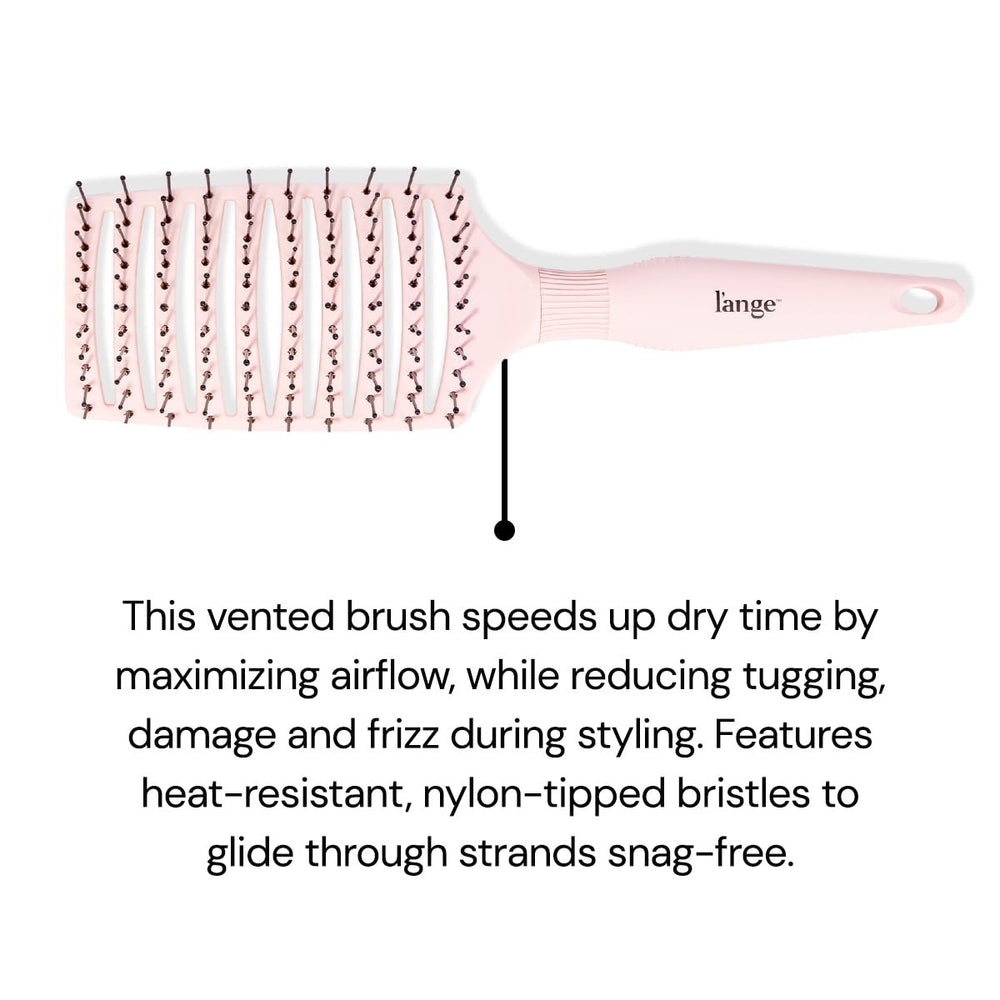 L'ANGE HAIR Siena wide vented brush brushing action illustrating snag-free styling.