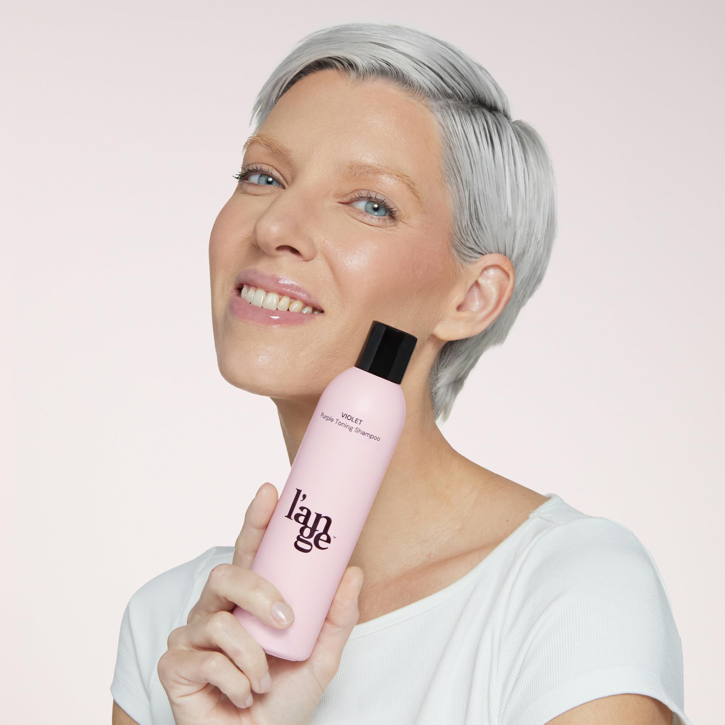 L'ANGE HAIR Violet Purple Toning Shampoo on-hair demonstrates color deposition for vibrant results.