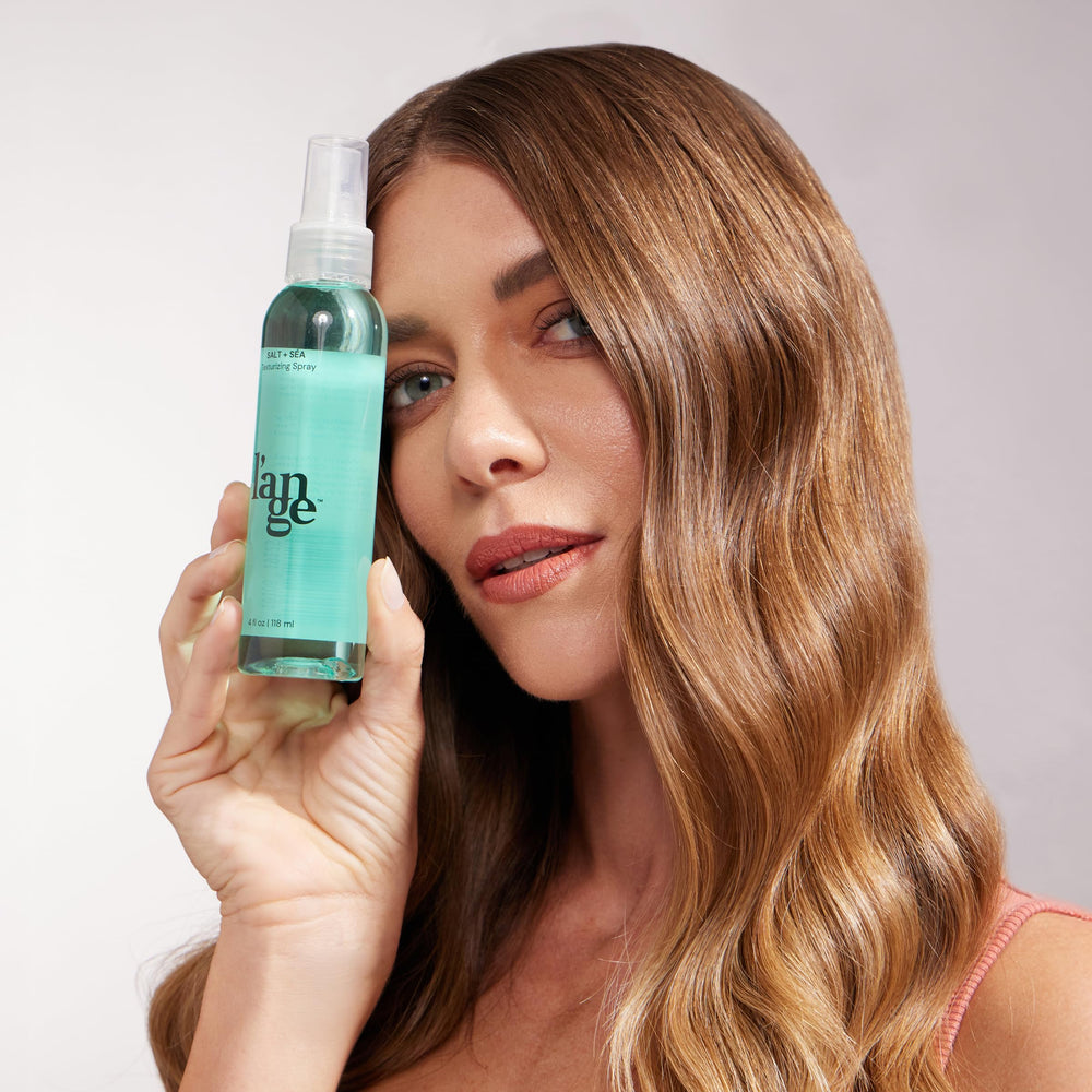 L'ANGE HAIR Sea Salt Texturizing Spray hair texture shows lifted roots and definition.